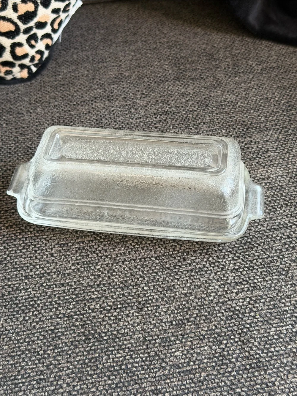 Small sized glass covered butter dish